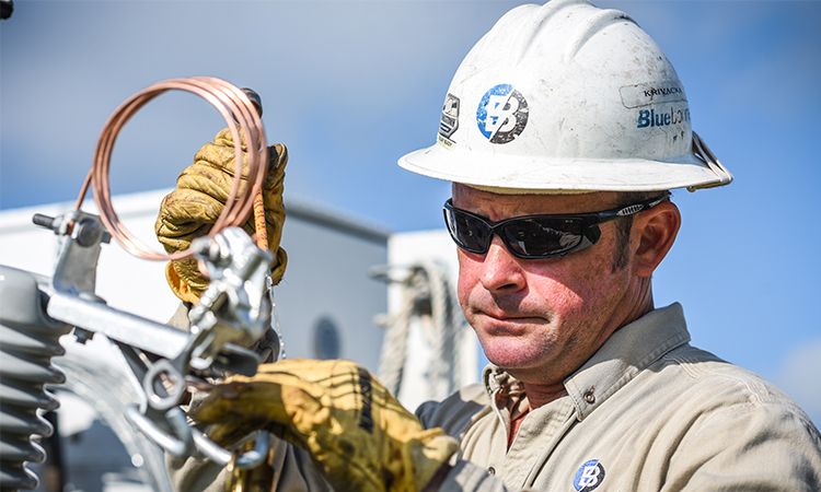 Check Bluebonnet's social media on April 11 for a tribute to our lineworkers. Here, Brandon Krivacka, in Brenham, prepares a transformer to be installed at a location where new construction is taking place. (Sarah Beal photo)