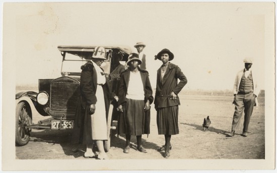 An unidentified group poses with a 1924 Ford Model T owned by Urissa Rhone before her marriage. Rhone family papers [di_10766]