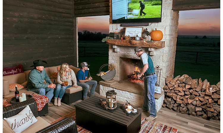 Bluebonnet members Brad and Amy Fritsch prepare s’mores in their poolside cabana with sons Logan, 16, and Lawson, 13. The space at their home in Willow Springs, between Fayetteville and Industry, enables them to still host family and friends through the pandemic and offers a cozy space to view spectacular sunsets.