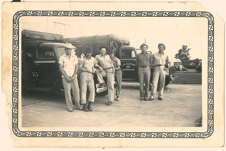 A handful of hardy linemen pose in 1947 at the cooperative’s headquarters in Giddings. Photo courtesy of Gene and Karen Urban