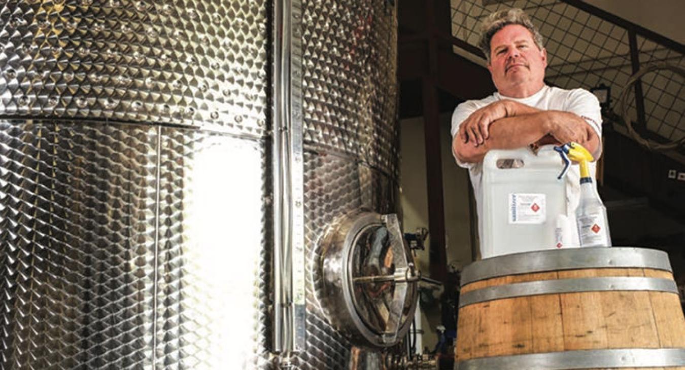 Instead of selling 2,500 gallons of bourbon aging in barrels to wholesalers, the 10-year-old company converted that alcohol into sought-after hand sanitizer. “We initially gave away 1,000 gallons to city and county first responders, EMS and area hospitals,” said Anthony Chiappetta, vice president of engineering at Bone Spirits. (Sarah Beal photo)