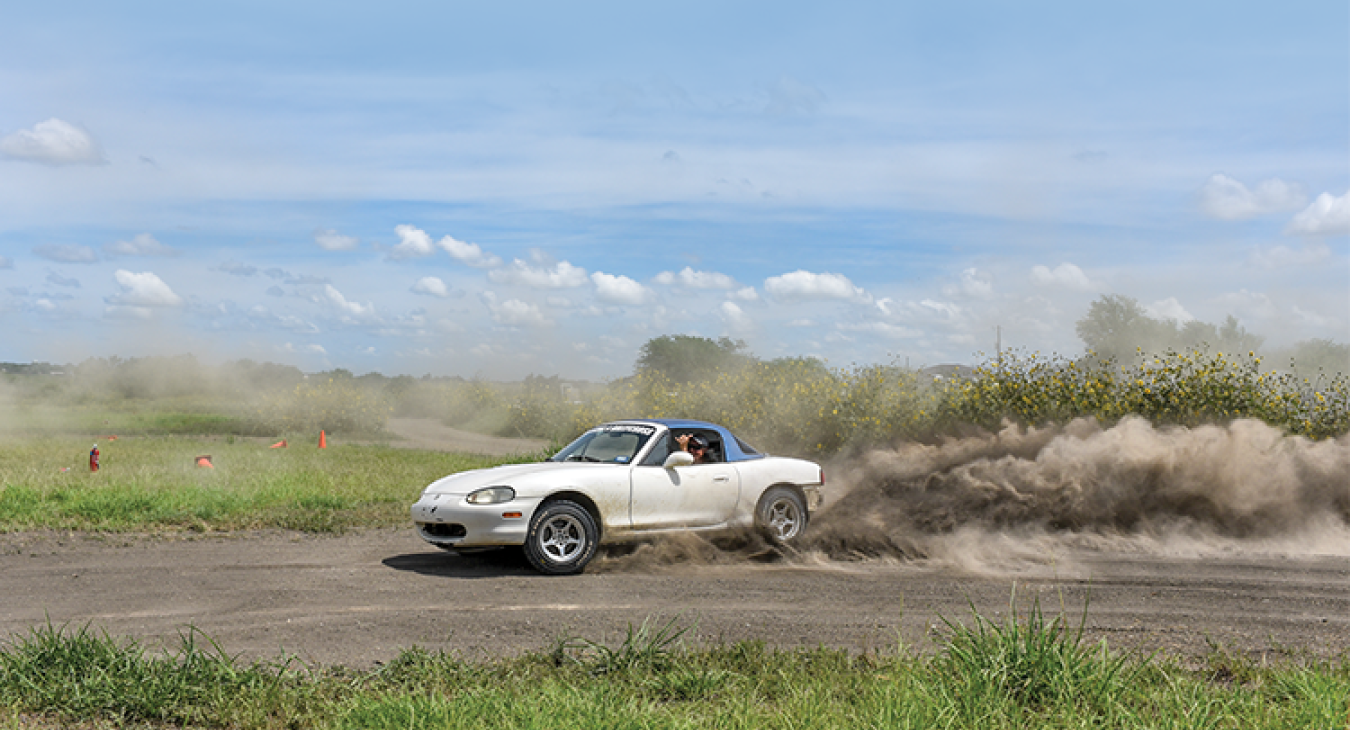 Brianne Corn doing what she loves: skidding around the dirt of her private racetrack. ‘Racing was the one thing I felt compelled to do,’ she said. (Sarah Beal photo)