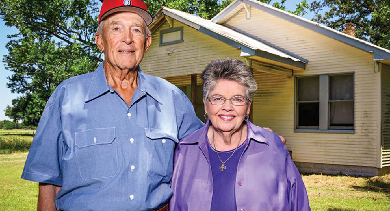 Oscar Dube Jr. and his wife, Loretta, recently visited the family farmhouse on Wolf Road in McDade, half a mile from their current ranch home. (Sarah Beal photo)