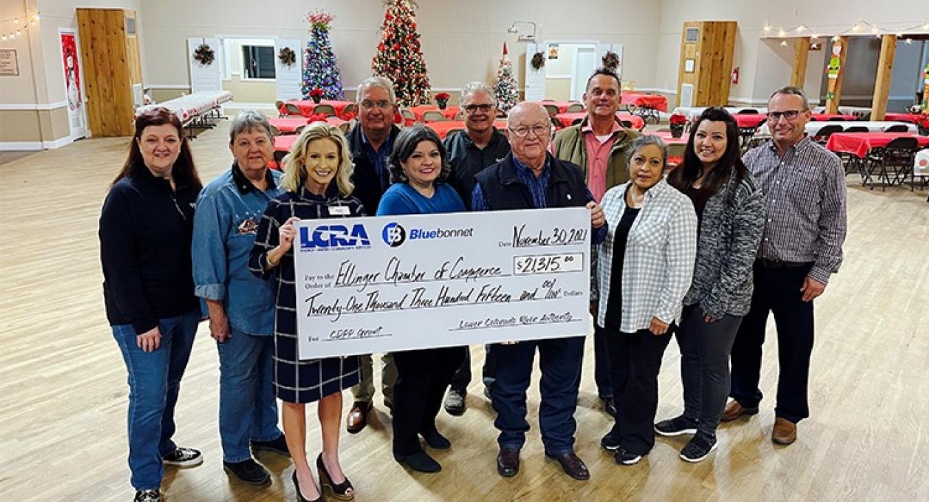 Pictured, from left to right are: Paula Urban, Ellinger Chamber of Commerce treasurer; Paulette Urban, Ellinger Chamber of Commerce director; Margaret D. “Meg” Voelter, LCRA board member; Mark Johnson, Bluebonnet Giddings-area community representative; Nicole Ramirez, Ellinger Chamber of Commerce vice president; Tom Kubena, Ellinger Chamber of Commerce director; Byron Balke, Bluebonnet Board assistant secretary/treasurer; Michael Schlabach, Ellinger Chamber of Commerce president; Charlotte Michalsky, Elling