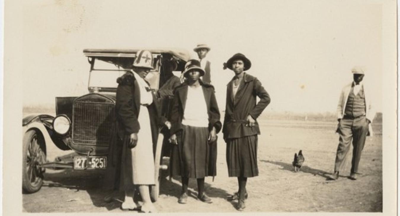 An unidentified group poses with a 1924 Ford Model T owned by Urissa Rhone before her marriage. Rhone family papers [di_10766]