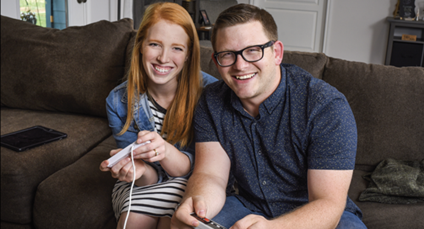 Joy and Travis Tharp became newlyweds and homeowners in the same month. The twentysomethings closed on their Bastrop home in March, 2017. Their home-buying checklist included energy efficiency and ‘smart’ technology options to remotely monitor and control energy use. Sarah Beal photo