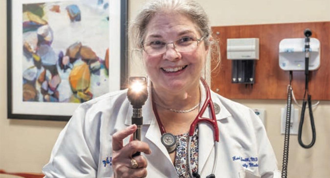 Dr. Karen Smith is a family medicine doctor at Baylor Scott & White Clinic in Manor. She has gone beyond her medical practice to help members of the community in other ways. Not only does she treat COVID-19 patients and others at the Manor clinic — and virtually through telemedicine — she works with community groups that provide food for those in need and call to check on people who are older and homebound. She is also a Bluebonnet member. (Ralph Barrera photo)