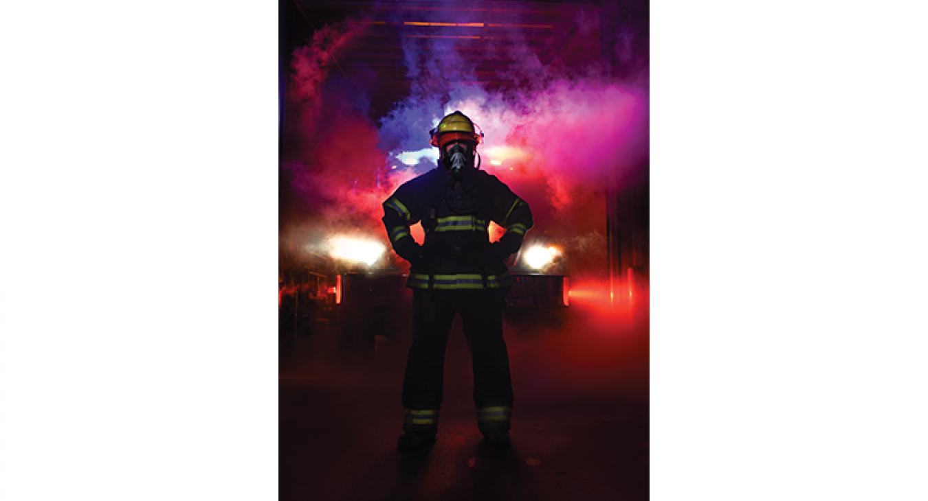 Andrew Murphy, a member of the Lincoln Volunteer Fire Department, displays the self-contained breathing system used amid heavy smoke. The department received a $19,893 grant in 2020 for a device to refill firefighters’ oxygen tanks. The device saves precious minutes in response time. (Sarah Beal photo)