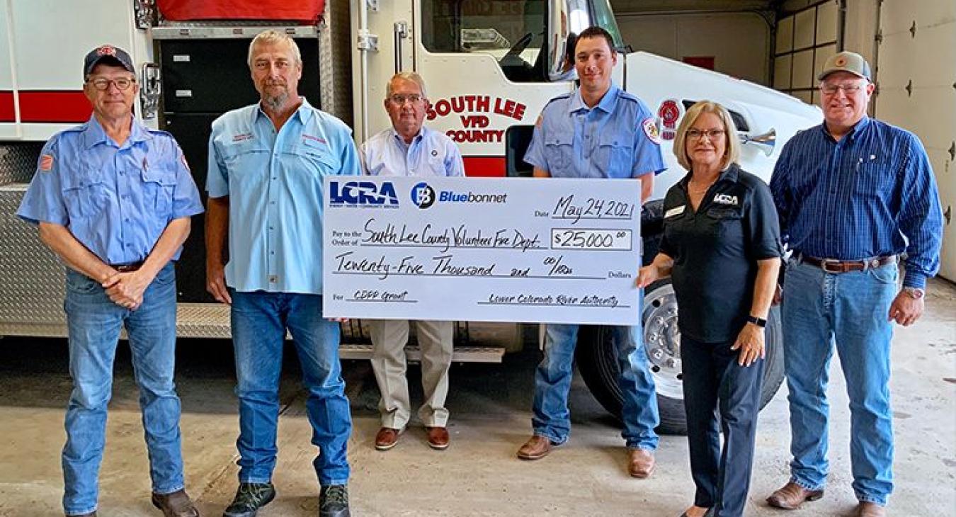 Pictured, from left to right, are: Ronald Zoch, South Lee VFD secretary; Chris Becker, South Lee VFD president; Mark Johnson, Bluebonnet community representative; Mason Becker, South Lee VFD drill captain #2; Lori A. Berger, LCRA board member; and Russell Jurk, Bluebonnet Board member.