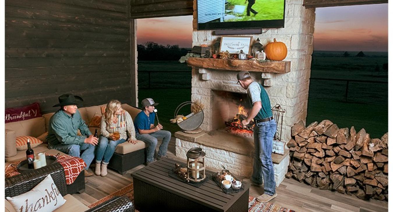 From left, Bluebonnet members Brad and Amy Fritsch prepare s’mores in their poolside cabana with sons Logan, 16, and Lawson, 13. The space at their home in Willow Springs, between Fayetteville and Industry, enables them to still host family and friends through the pandemic and offers a cozy space to view spectacular sunsets.