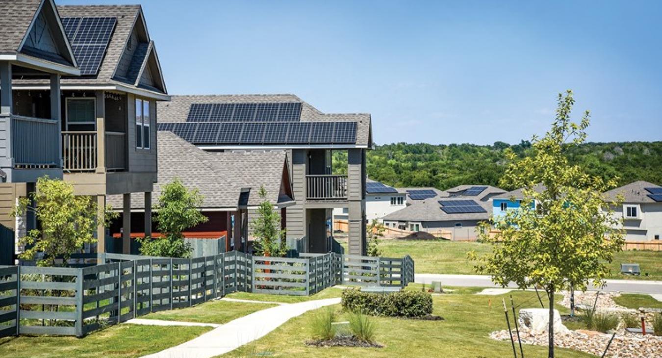 Whisper Valley, a master-planned community in the Manor area, offers a unique package of green features, including solar panels, a geothermal heating and cooling system, and community gardens.