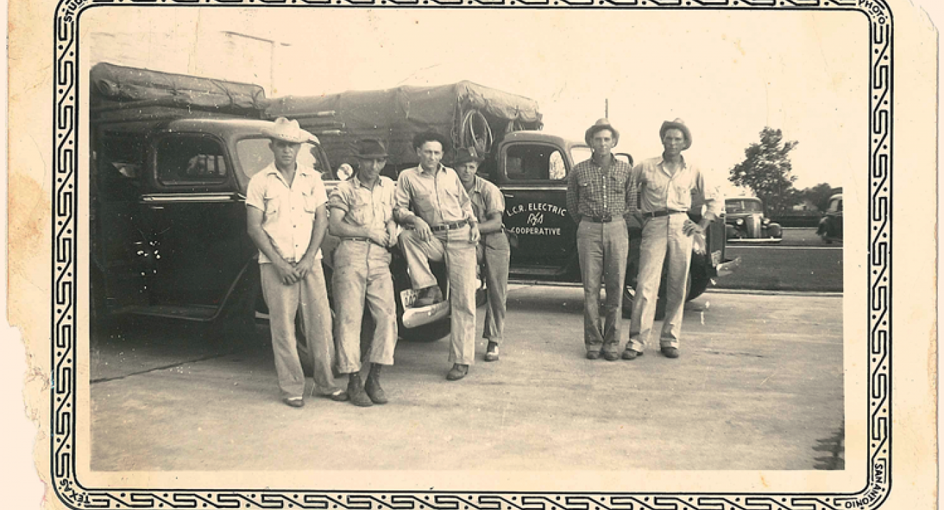 A handful of hardy linemen pose in 1947 at the cooperative’s headquarters in Giddings. Photo courtesy of Gene and Karen Urban