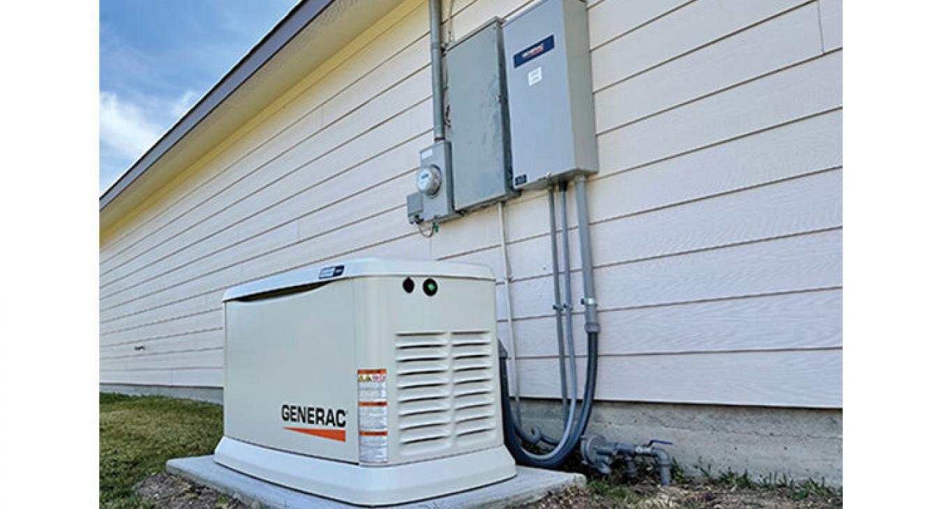 A home in the Giddings area with a Generac standby generator and essential pieces of equipment that allow it to switch from electric grid power to generator power. A Bluebonnet line worker must be on site to disconnect power to a member’s home before a standby generator can be installed. (Alyssa Dussetschleger photo)
